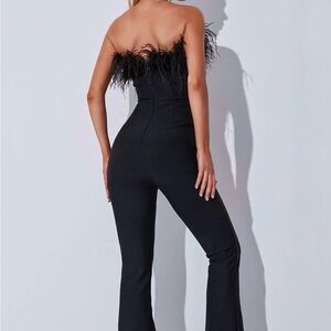 Elegant Black Strapless Jumpsuit with Feather Detail